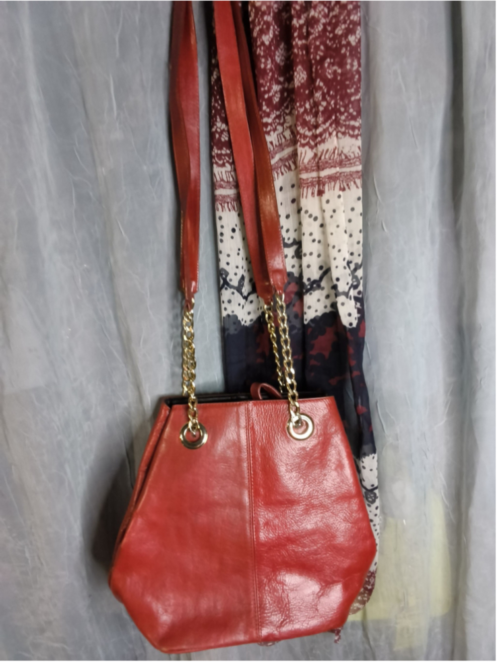 red hobo-style shoulder bag